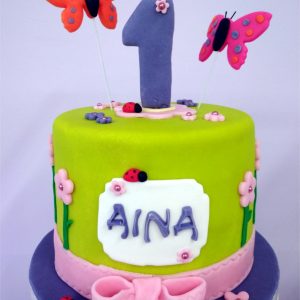 Tarta primer aniversario mariposas jardin